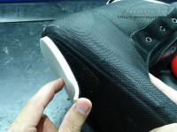 Shock absorber made of foam and attached with velcro