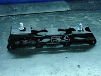 The frame with the screws where the holes should probably be
