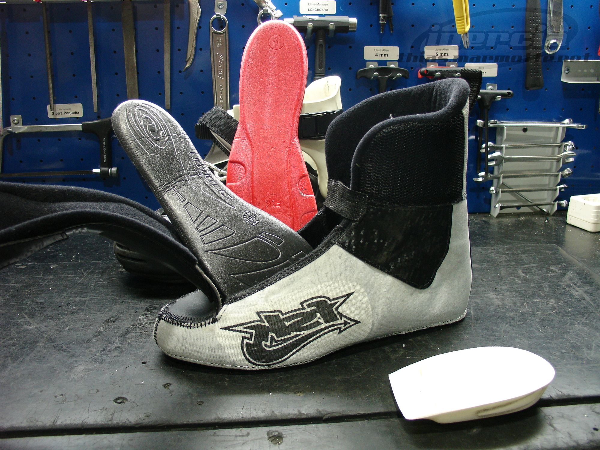 Liner, inner and outer soles and shock absorber